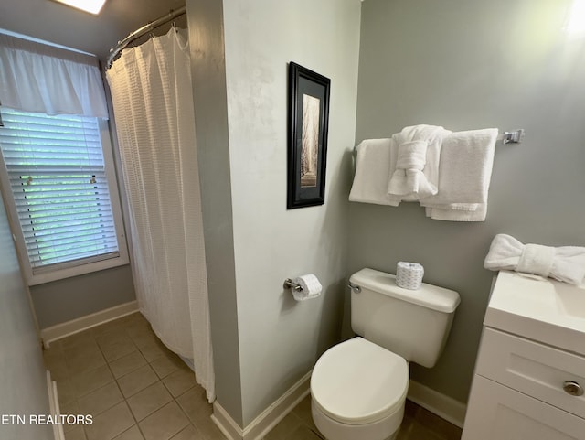 full bath with tile patterned flooring, baseboards, toilet, vanity, and a shower with shower curtain