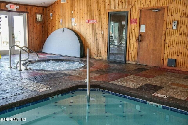 indoor pool with french doors