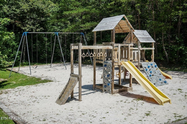 communal playground with a view of trees