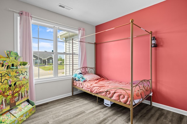350 Hartfield Ln, Loudon, TN 37774 - bedroom with wood finished floors, multiple windows, and baseboards