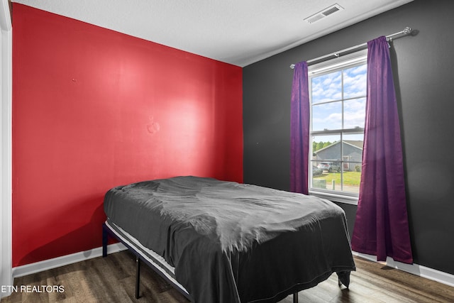 350 Hartfield Ln, Loudon, TN 37774 - bedroom featuring wood finished floors and baseboards