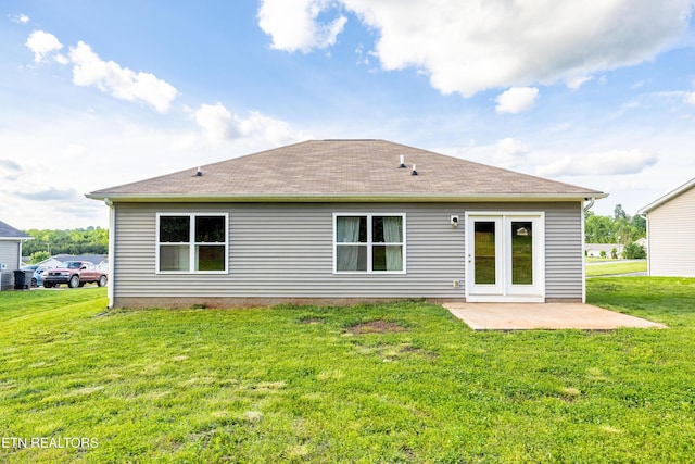 350 Hartfield Ln, Loudon, TN 37774 - rear view of house with a yard, a patio, and roof with shingles