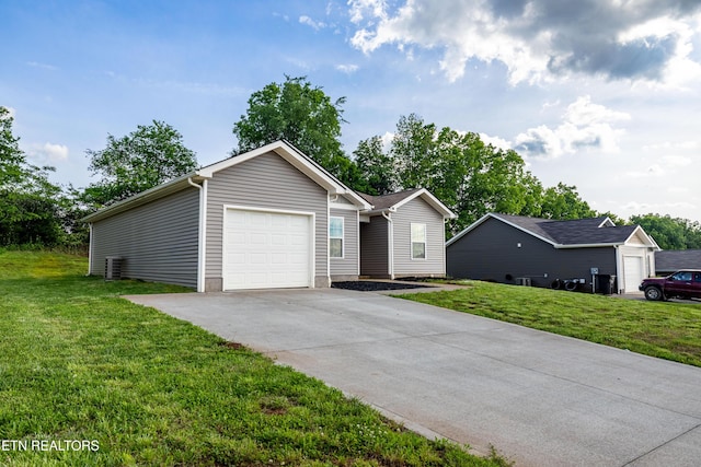 350 Hartfield Ln, Loudon, TN 37774 - single story home with concrete driveway, an attached garage, and a front yard