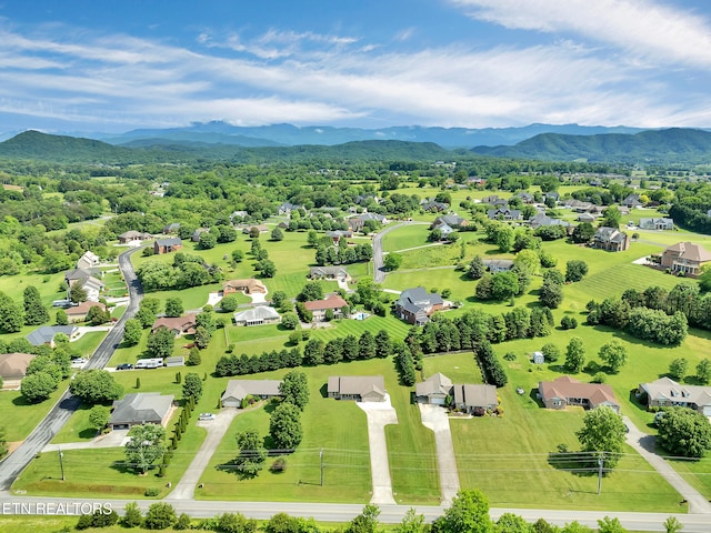 aerial perspective of suburban area with mountains