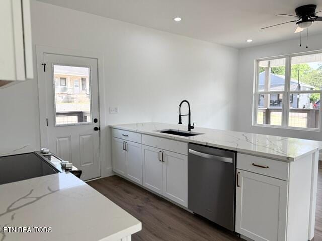1118 NW Mercer St, Knoxville, TN 37921 - kitchen featuring dishwasher, a sink, a peninsula, a ceiling fan, and dark wood-type flooring