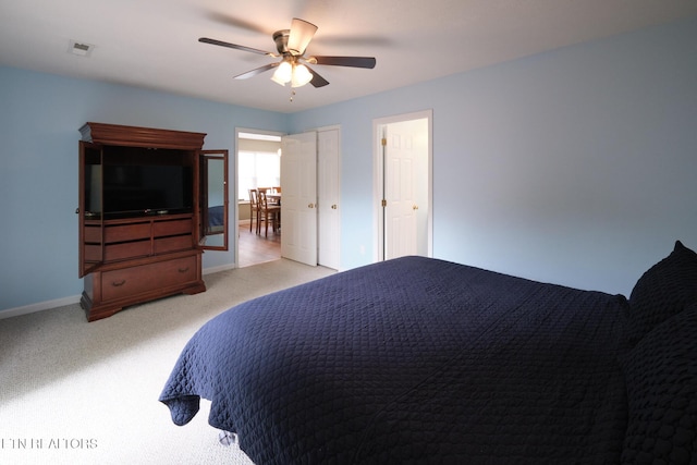 bedroom featuring carpet flooring, baseboards, and a ceiling fan