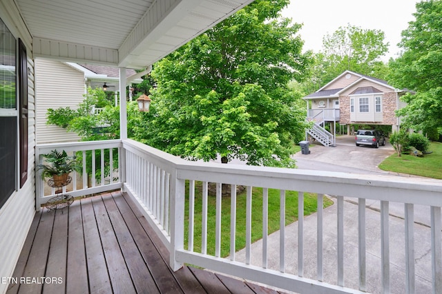 wooden deck featuring covered porch