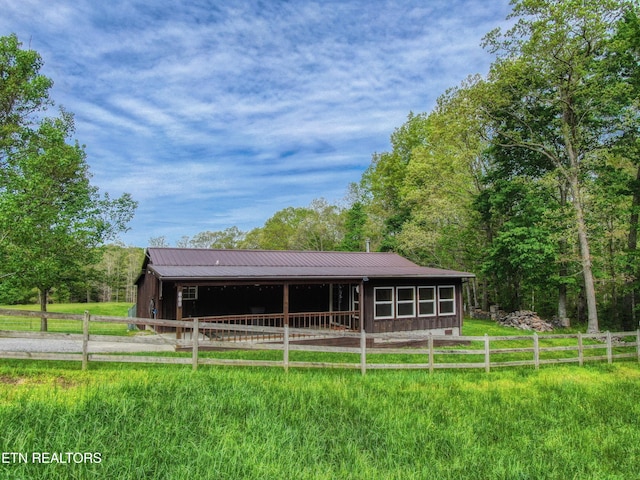 112 Auda Story, Jamestown, TN 38556 - view of front of property with an outdoor structure, metal roof, and an exterior structure