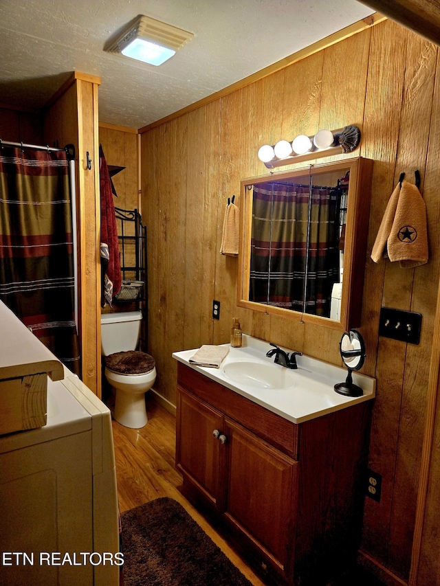 112 Auda Story, Jamestown, TN 38556 - full bath with wooden walls, vanity, wood finished floors, toilet, and a shower with shower curtain