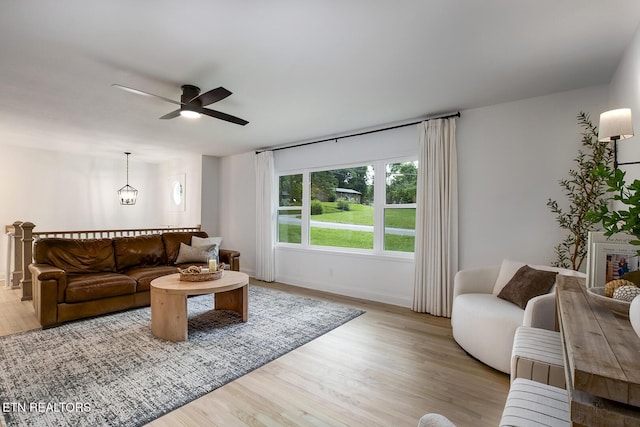 133 Nebraska Ave, Oak Ridge, TN 37830 - living room featuring wood finished floors, ceiling fan, and baseboards