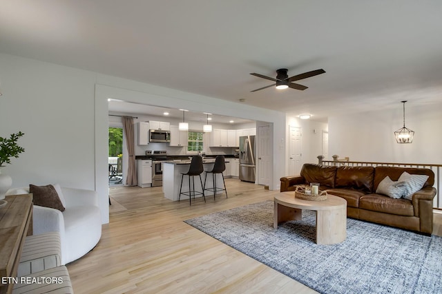 133 Nebraska Ave, Oak Ridge, TN 37830 - living room featuring ceiling fan and light wood-style flooring