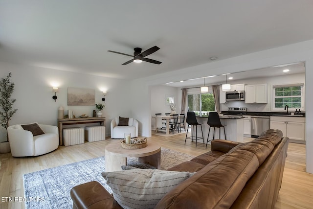 133 Nebraska Ave, Oak Ridge, TN 37830 - living room featuring ceiling fan and light wood-type flooring