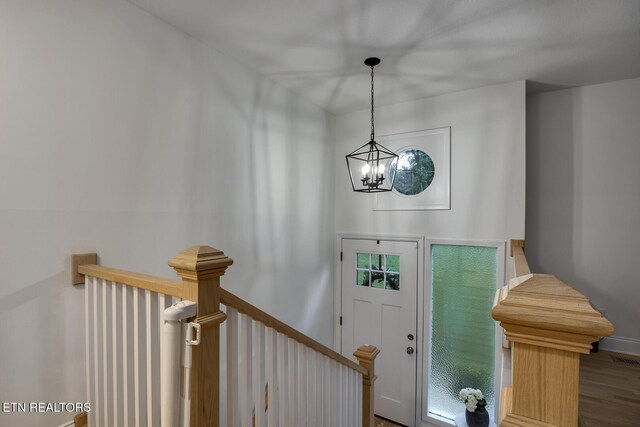 133 Nebraska Ave, Oak Ridge, TN 37830 - entrance foyer with a chandelier, wood finished floors, and baseboards