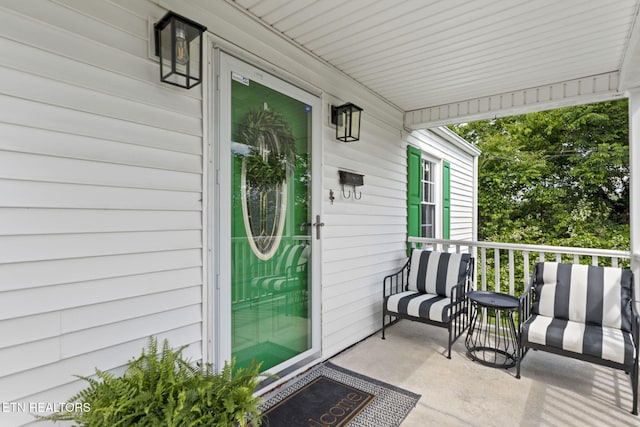 313 Lamar Ave, Clinton, TN 37716 - view of exterior entry featuring a porch