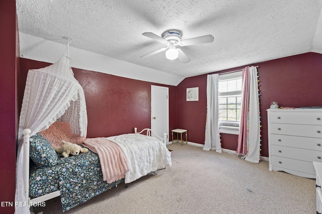 313 Lamar Ave, Clinton, TN 37716 - carpeted bedroom with lofted ceiling, a textured ceiling, baseboards, and ceiling fan