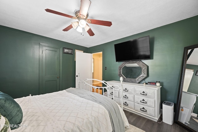 313 Lamar Ave, Clinton, TN 37716 - bedroom with dark wood-type flooring, baseboards, and ceiling fan