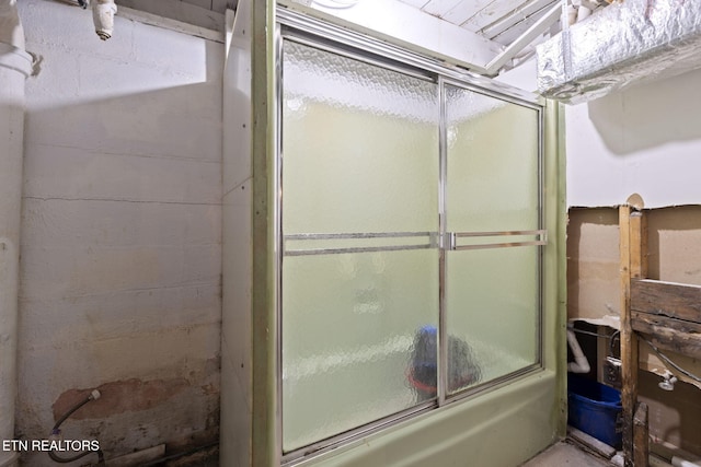 313 Lamar Ave, Clinton, TN 37716 - full bathroom featuring bath / shower combo with glass door