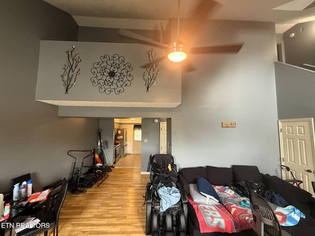 119 Hanover Pl, Oak Ridge, TN 37830 - living area with light wood-style flooring and a towering ceiling