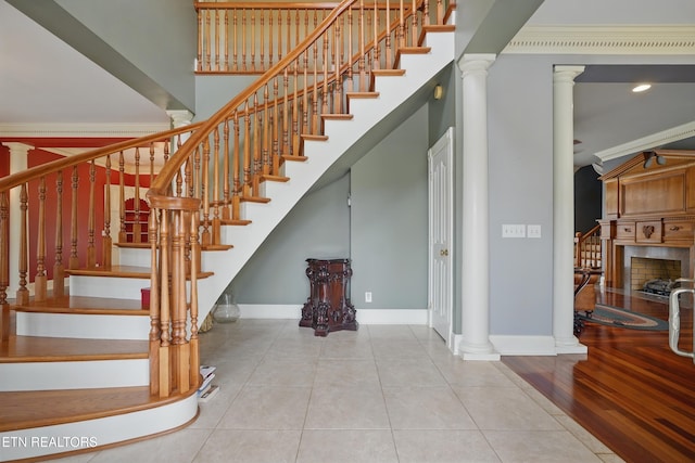 6005 Powell Valley Rd, Big Stone Gap, VA 24219 - stairs featuring baseboards, ornate columns, ornamental molding, and tile patterned floors
