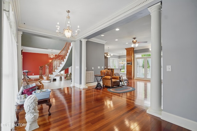 6005 Powell Valley Rd, Big Stone Gap, VA 24219 - entryway featuring decorative columns, crown molding, ceiling fan, baseboards, and wood-type flooring
