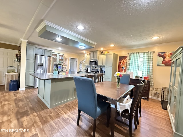 332 Tomlinson Rd, Pennington Gap, VA 24277 - dining area featuring crown molding, a textured ceiling, light wood-style floors, and recessed lighting