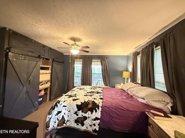 332 Tomlinson Rd, Pennington Gap, VA 24277 - bedroom featuring a ceiling fan and a textured ceiling