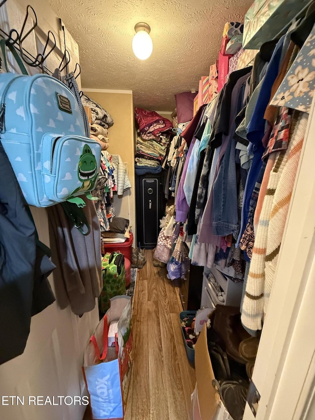332 Tomlinson Rd, Pennington Gap, VA 24277 - walk in closet with wood finished floors