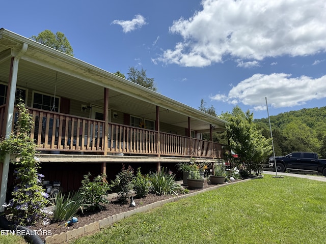 332 Tomlinson Rd, Pennington Gap, VA 24277 - view of property exterior featuring a yard