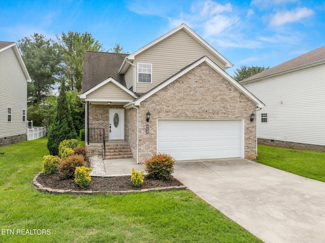 608 Lynnwood Dr, Athens, TN 37303 - view of front of home with brick siding, a front lawn, driveway, and a garage