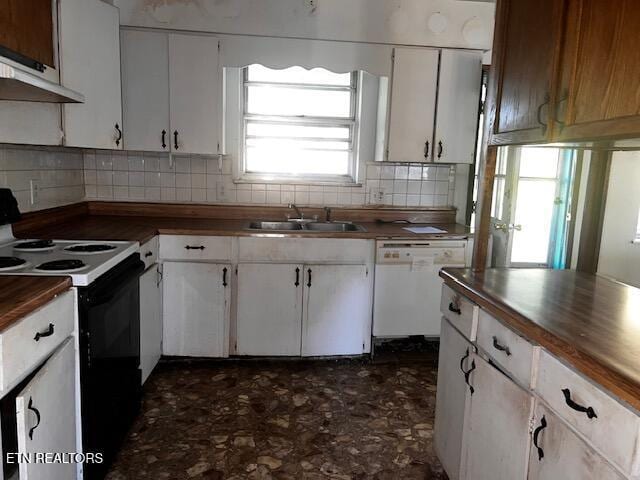 867 Pleasant Ridge Rd, Lafollette, TN 37766 - kitchen with black electric range, dishwasher, a sink, wooden counters, and decorative backsplash