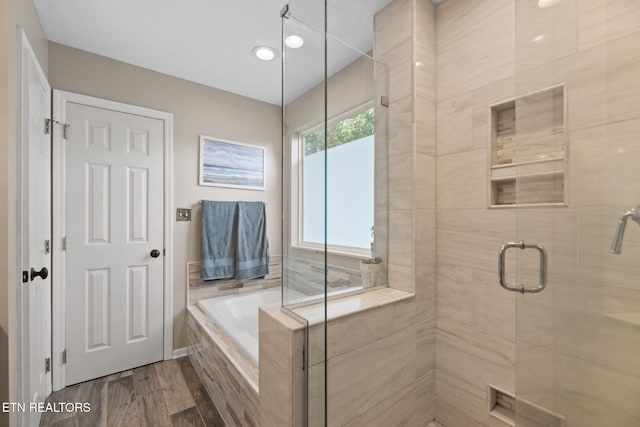 717 Briar Way, Knoxville, TN 37923 - full bathroom with a garden tub, a stall shower, and wood finished floors