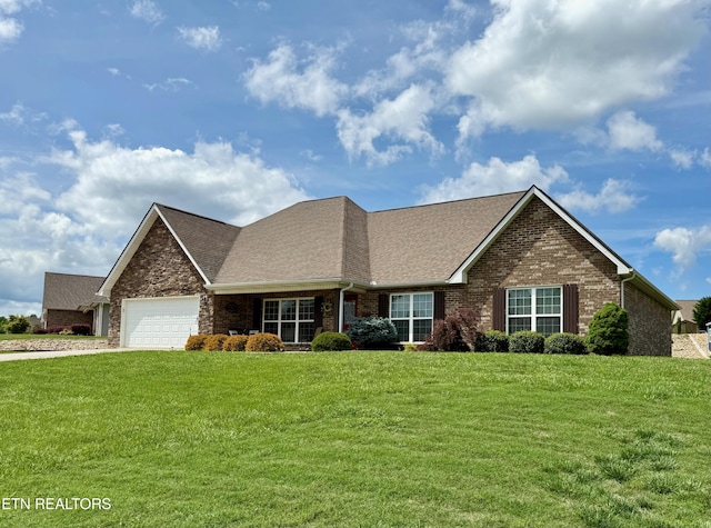 1617 Millstone Dr, Maryville, TN 37803 - view of front of property featuring brick siding, a front lawn, an attached garage, and a shingled roof