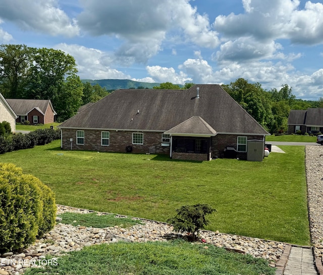 1617 Millstone Dr, Maryville, TN 37803 - rear view of property featuring a yard and brick siding