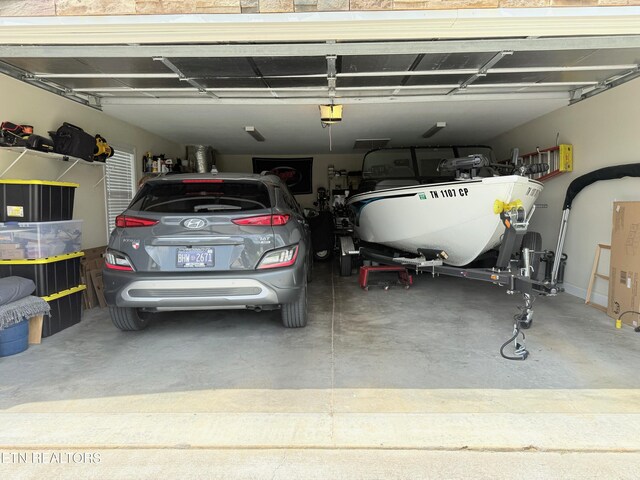 1617 Millstone Dr, Maryville, TN 37803 - garage featuring a garage door opener