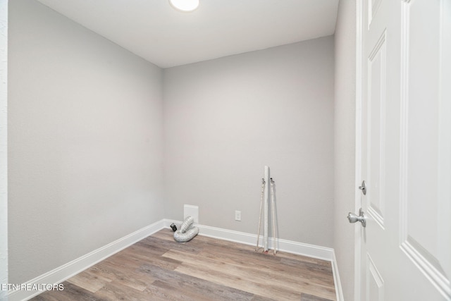 406 S Indiana Ave, Lafollette, TN 37766 - laundry area with baseboards and light wood-style floors