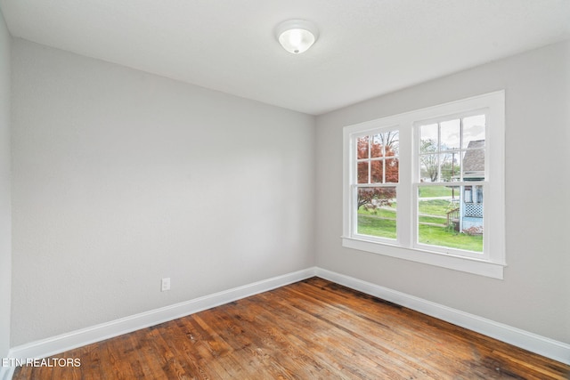 406 S Indiana Ave, Lafollette, TN 37766 - unfurnished room with baseboards and wood finished floors
