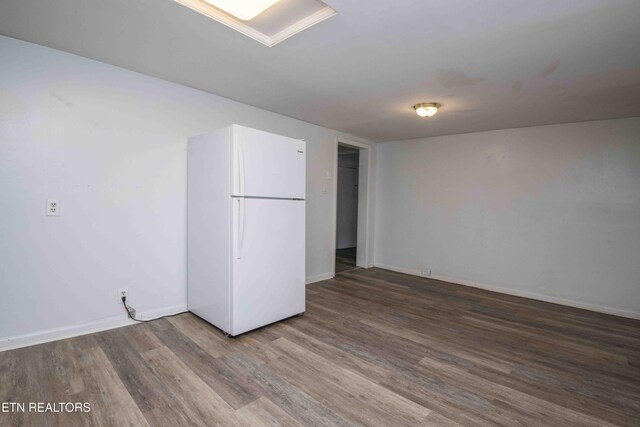 2918 Johnston St, Knoxville, TN 37921 - empty room with wood finished floors and baseboards