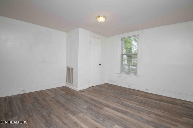2918 Johnston St, Knoxville, TN 37921 - empty room with wood finished floors and baseboards