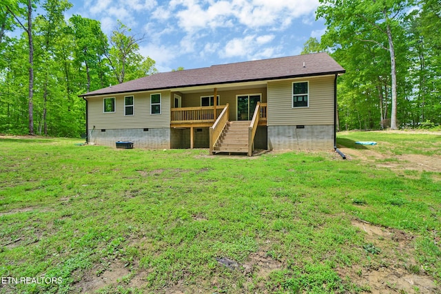 98 Paso Fino Trl, Jamestown, TN 38556 - back of house featuring crawl space, stairs, a wooden deck, and a lawn