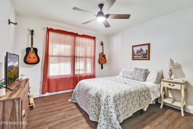 98 Paso Fino Trl, Jamestown, TN 38556 - bedroom with wood finished floors, baseboards, and a ceiling fan