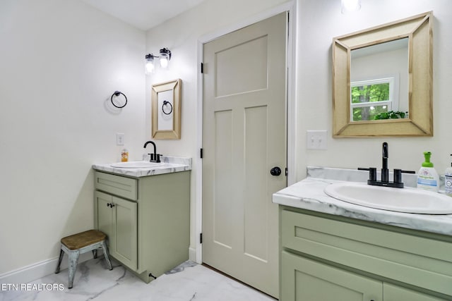 98 Paso Fino Trl, Jamestown, TN 38556 - bathroom featuring marble finish floors, two vanities, and baseboards