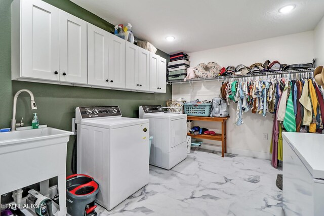 98 Paso Fino Trl, Jamestown, TN 38556 - washroom featuring cabinet space, washer and clothes dryer, light marble finish floors, and recessed lighting