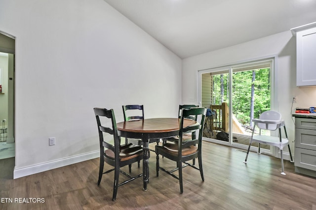 98 Paso Fino Trl, Jamestown, TN 38556 - dining space with vaulted ceiling, wood finished floors, and baseboards