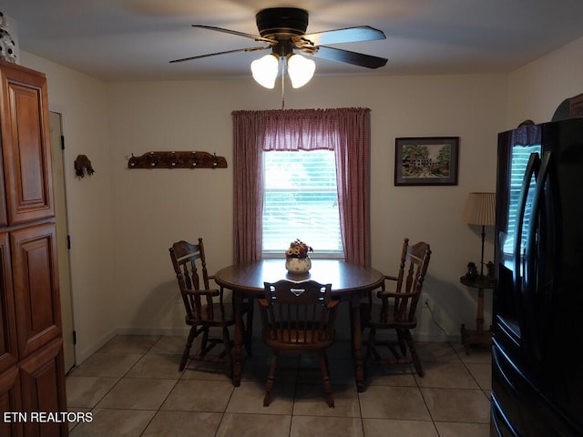 3381 Upper Caney Valley Rd, Tazewell, TN 37879 - dining room with light tile patterned flooring, a ceiling fan, and baseboards