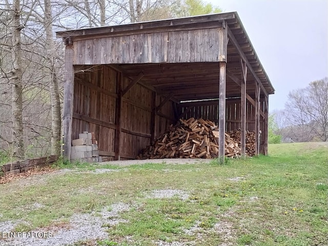 3381 Upper Caney Valley Rd, Tazewell, TN 37879 - view of pole building featuring a yard