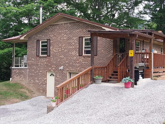 3381 Upper Caney Valley Rd, Tazewell, TN 37879 - view of front of home with brick siding