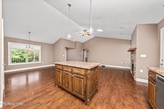 2689 Spruce Loop, Crossville, TN 38555 - kitchen featuring dishwasher, a ceiling fan, dark wood-style floors, baseboards, and lofted ceiling