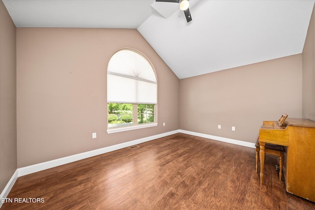 2689 Spruce Loop, Crossville, TN 38555 - spare room with wood finished floors, ceiling fan, lofted ceiling, and baseboards