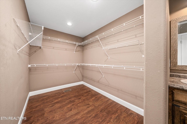 2689 Spruce Loop, Crossville, TN 38555 - walk in closet featuring wood finished floors