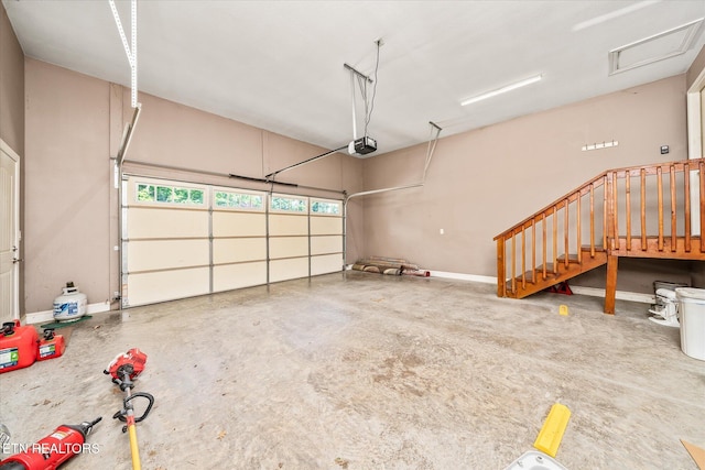 2689 Spruce Loop, Crossville, TN 38555 - garage featuring a garage door opener and baseboards